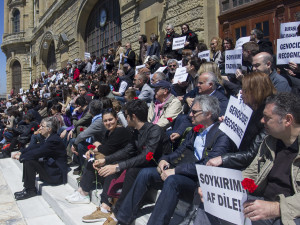 The activists bear posters demanding recognition of the Armenian Genocide at the Haydarpasa railway station. 100 years ago, on April 24, 250 Armenian intellectuals were incarcerated in this very station, before being sent to death.